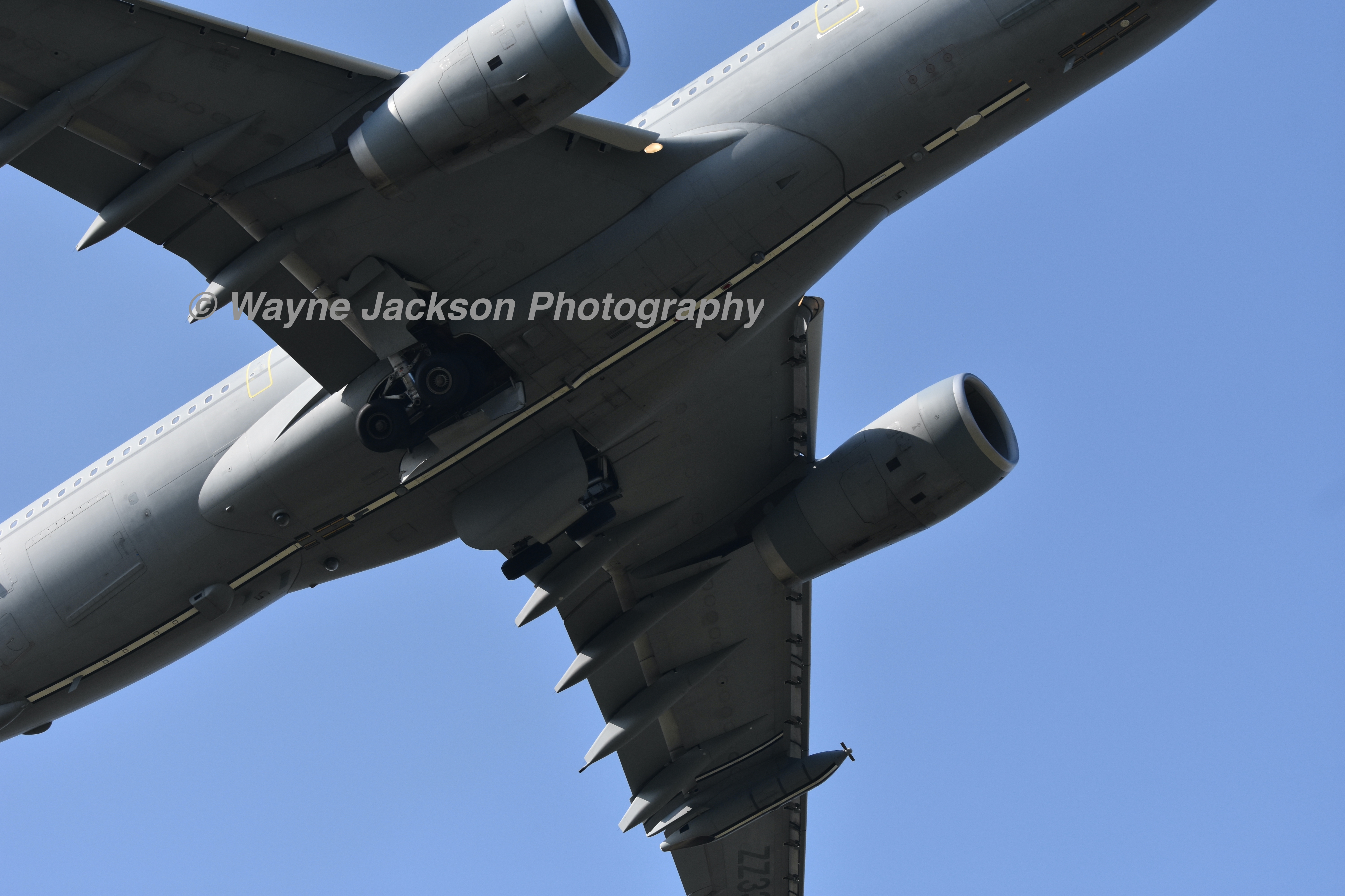 An abstract image of a military aircraft flying out of RAF Brize Norton, Carterton in Oxfordshire, England