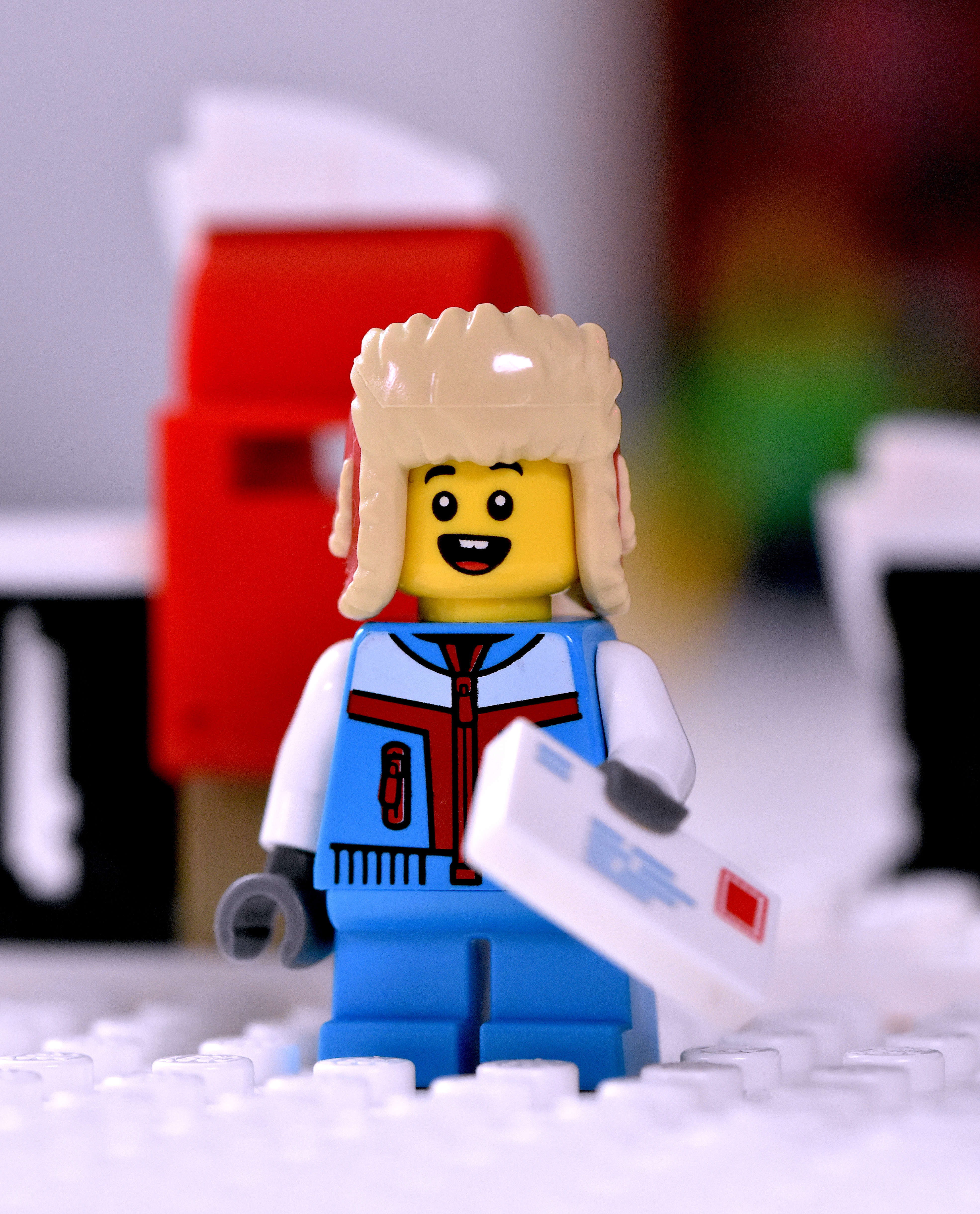 A Lego boy minifigure from the Holiday Main Street Christmas set