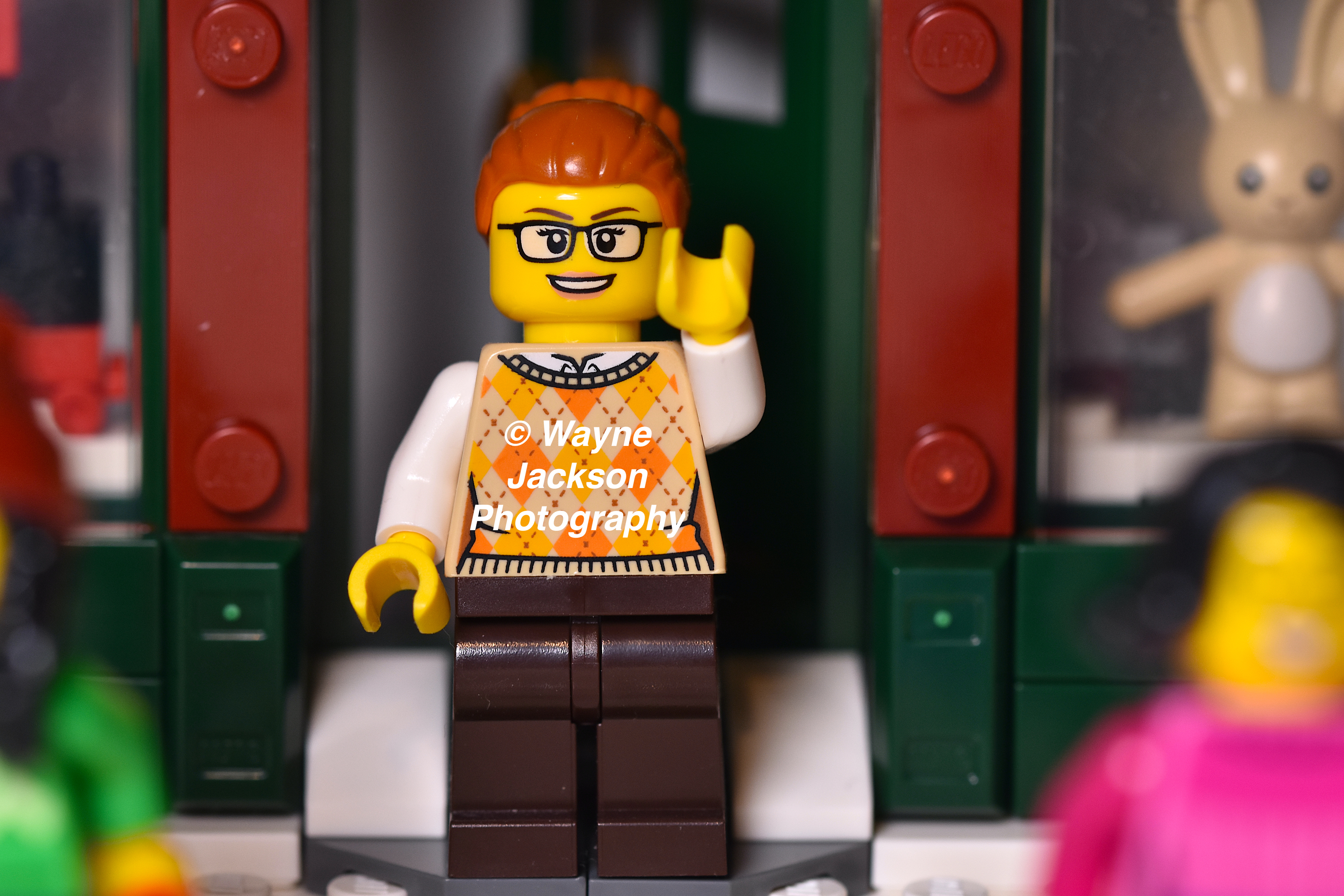 A Lego minifigure shopkeeper