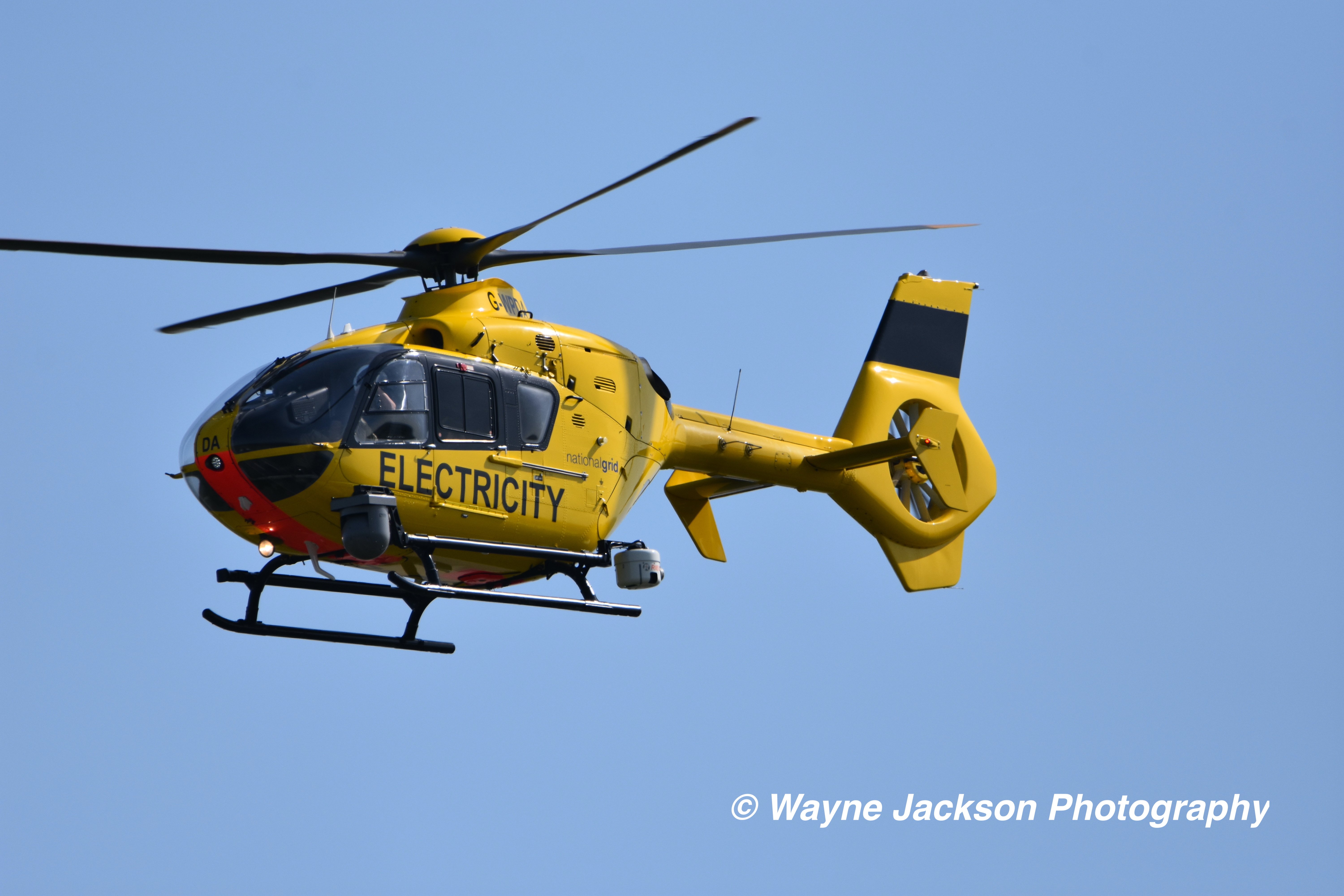 A National Grid Yellow Electricity EC 135 Eurocopter Helicopter based at Bristol Airport
